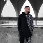 Black hoodie and jogger set with Arabic calligraphy print by Isla Elegance